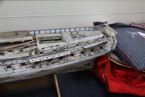 An 18th century wooden model of a thirty two gun Ship of The Line, length 3ft 2in.